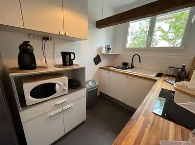 Cuisine ou kitchenette dans l'établissement « L’Hilo » Appart 4 Personnes À 250 m de la Plage