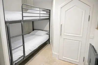 Un ou plusieurs lits dans un hébergement de l'établissement Logement Moderne & Spacieux au cœur de CAEN