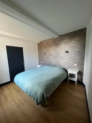 Un ou plusieurs lits dans un hébergement de l'établissement Bright Apt 70m2 in Bayeux historic center w Pkg