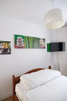 Un ou plusieurs lits dans un hébergement de l'établissement Appartement 3 pièces - Cabourg