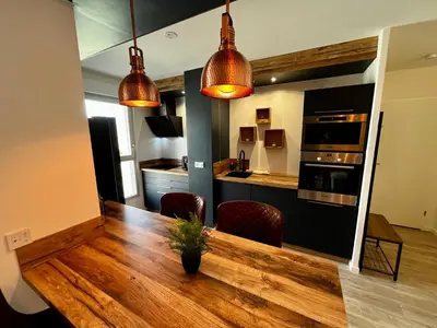 Cuisine ou kitchenette dans l'établissement Appartement de standing avec parking privé