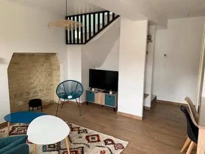 Télévision ou salle de divertissement dans l'établissement Maison au calme - entre Caen et la mer