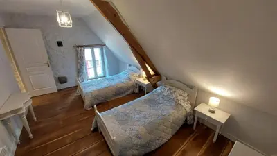 Coin salon dans l'établissement Gîte charmant à la campagne
