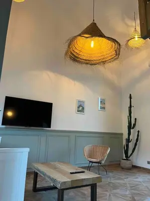Télévision ou salle de divertissement dans l'établissement Gite les bois d Orceil