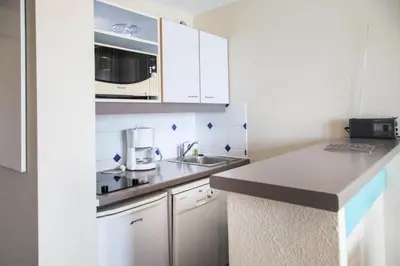 Cuisine ou kitchenette dans l'établissement Résidence Port Guillaume - maeva Home - 3 Pièces 6 Personnes Sélection MAE-1552