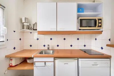 Cuisine ou kitchenette dans l'établissement Les maisons de Port Guillaume - maeva Home - Maison 3 pièces 6 personnes - Confort MAE-3464