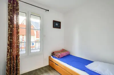 Un ou plusieurs lits dans un hébergement de l'établissement Les maisons de Port Guillaume - maeva Home - Maison 3 pièces 6 personnes - Confort MAE-3464
