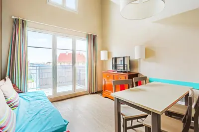 Télévision ou salle de divertissement dans l'établissement Résidence Port Guillaume - maeva Home - Appartement 2 pièces 6 pers Sélection MAE-7351
