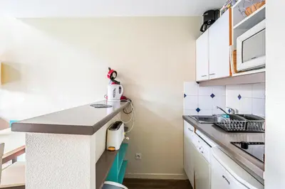 Cuisine ou kitchenette dans l'établissement Résidence Port Guillaume - maeva Home - Appartement 2 pièces 6 pers Sélection MAE-7351
