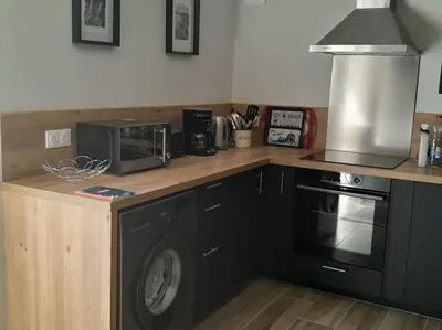 Cuisine ou kitchenette dans l'établissement Gîte tante Jeanne