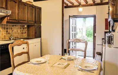 Cuisine ou kitchenette dans l'établissement Le Colibri
