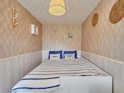 Un ou plusieurs lits dans un hébergement de l'établissement Holiday Home La Marinière by Interhome
