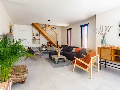 Coin salon dans l'établissement Holiday Home La Dune by Interhome
