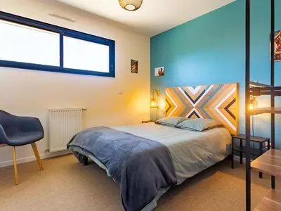 Un ou plusieurs lits dans un hébergement de l'établissement Holiday Home La Dune by Interhome