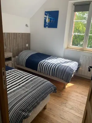 Un ou plusieurs lits dans un hébergement de l'établissement La maisonnette de la gare