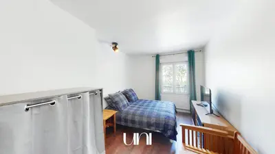 Un ou plusieurs lits dans un hébergement de l'établissement Appartement cosy d'Auge