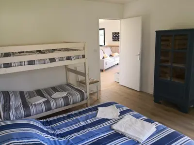 Un ou plusieurs lits dans un hébergement de l'établissement Gîtes des Embruns