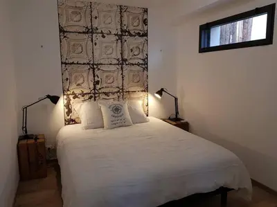 Un ou plusieurs lits dans un hébergement de l'établissement L'Escapade T1 de 30 m2 neuf.
