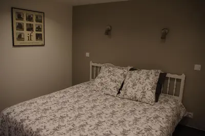 Un ou plusieurs lits dans un hébergement de l'établissement Cosy ferme de village en baie du Mont Saint Michel