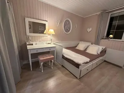 Un ou plusieurs lits dans un hébergement de l'établissement Gîte gold beach - Logis des hirondelles classé 4 étoiles
