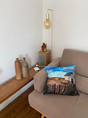 Coin salon dans l'établissement La maison bleue vacance et jardin, la mer à 550 m