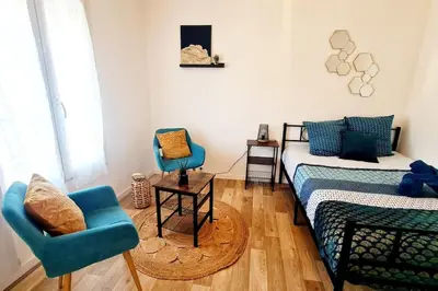 Coin salon dans l'établissement Le petit Cocon Bleu