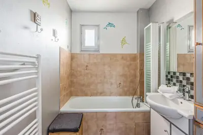 Salle de bains dans l'établissement Appartement Paroco - Welkeys