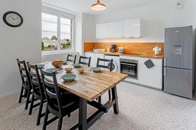 Cuisine ou kitchenette dans l'établissement Loft british au pied du Mont !