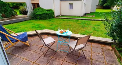 Jardin de l'établissement Appartement avec jardin - Centre-ville à 10 minutes à pied