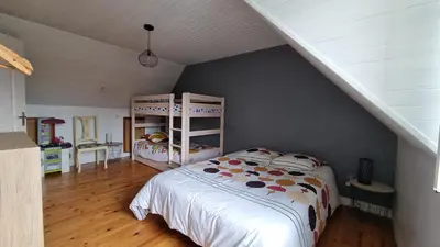 Un ou plusieurs lits dans un hébergement de l'établissement Une petite maison du Rozel - gite tout confort