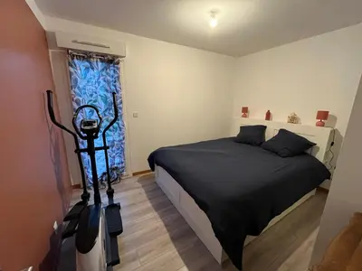 Un ou plusieurs lits dans un hébergement de l'établissement Maison plain-pied 4 chambres Graye sur mer plage à 700 m