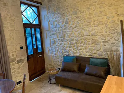 Coin salon dans l'établissement Charmante petite maison