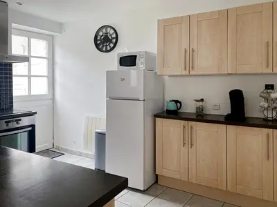 Cuisine ou kitchenette dans l'établissement Le Chaume