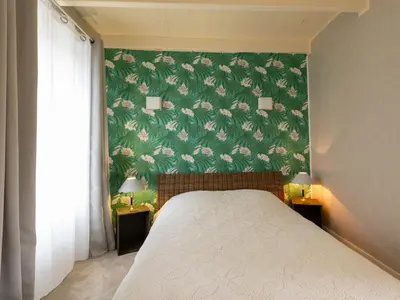 Un ou plusieurs lits dans un hébergement de l'établissement Holiday Home Océane by Interhome