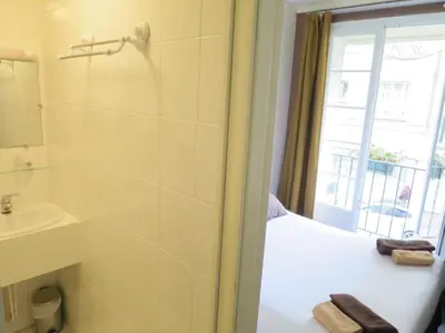 Salle de bains dans l'établissement Hotel de la Paix
