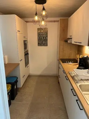 Cuisine ou kitchenette dans l'établissement Bayeux