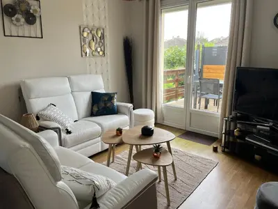 Coin salon dans l'établissement Maison à 700m de la plage