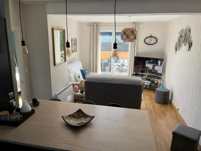 Télévision ou salle de divertissement dans l'établissement Maison à 700m de la plage