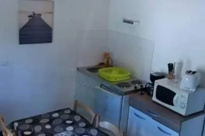 Cuisine ou kitchenette dans l'établissement Aux portes du mont saint michel