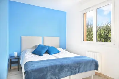 Un ou plusieurs lits dans un hébergement de l'établissement Chez Marie et Philippe - 1km de la plage