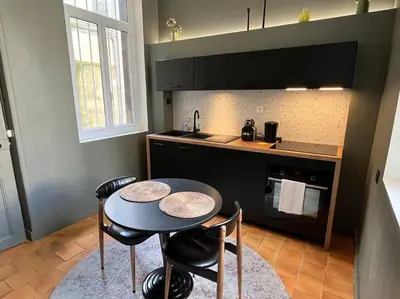 Cuisine ou kitchenette dans l'établissement Appartement au coeur de Caen
