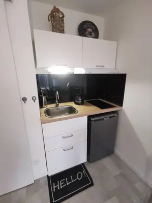 Cuisine ou kitchenette dans l'établissement Ôcalme, Idéal à 2, jardin, plage