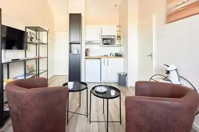 Cuisine ou kitchenette dans l'établissement Le Répit - Vue port à 200m de la plage