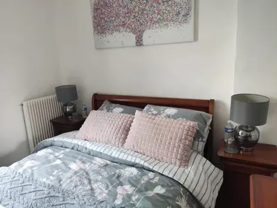 Un ou plusieurs lits dans un hébergement de l'établissement Marianne Cottage Chambre d'Hotes