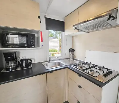 Cuisine ou kitchenette dans l'établissement Camping Riva Bella