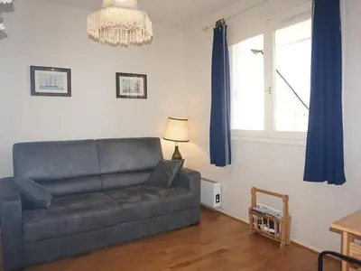 Coin salon dans l'établissement Duplex lumineux 3 chambres, terrasse, parking, à deux pas de la plage de Cabourg - FR-1-465-103
