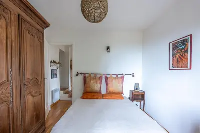 Un ou plusieurs lits dans un hébergement de l'établissement Emji - Maison proche de la plage