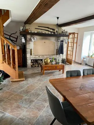 Coin salon dans l'établissement Le Taut 44 - chambre Utah - salle de bains partagée