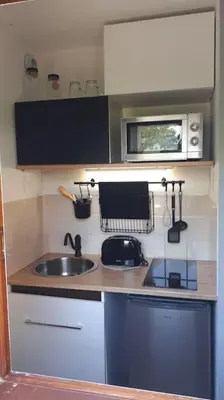 Cuisine ou kitchenette dans l'établissement Studio Cabourg - Home-Varaville avec jardin