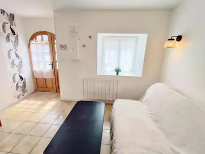 Un ou plusieurs lits dans un hébergement de l'établissement Maison 30m2 - 1 chambre - Jardin